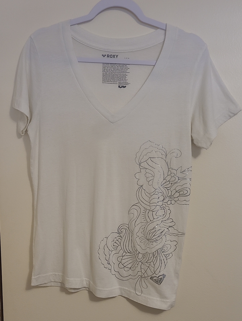 Roxy White V‑Neck Short Sleeve Tee with Floral Outline